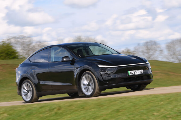 tesla model y 2025 review front action blur 9295